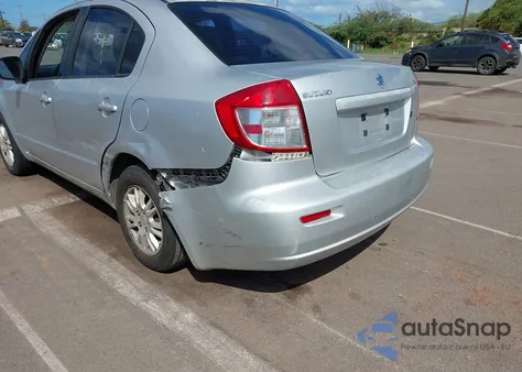 2012 Suzuki Sx4 Le/Le Popular z USA, uszkodzony, nr VIN JS2YC5A30C6305764